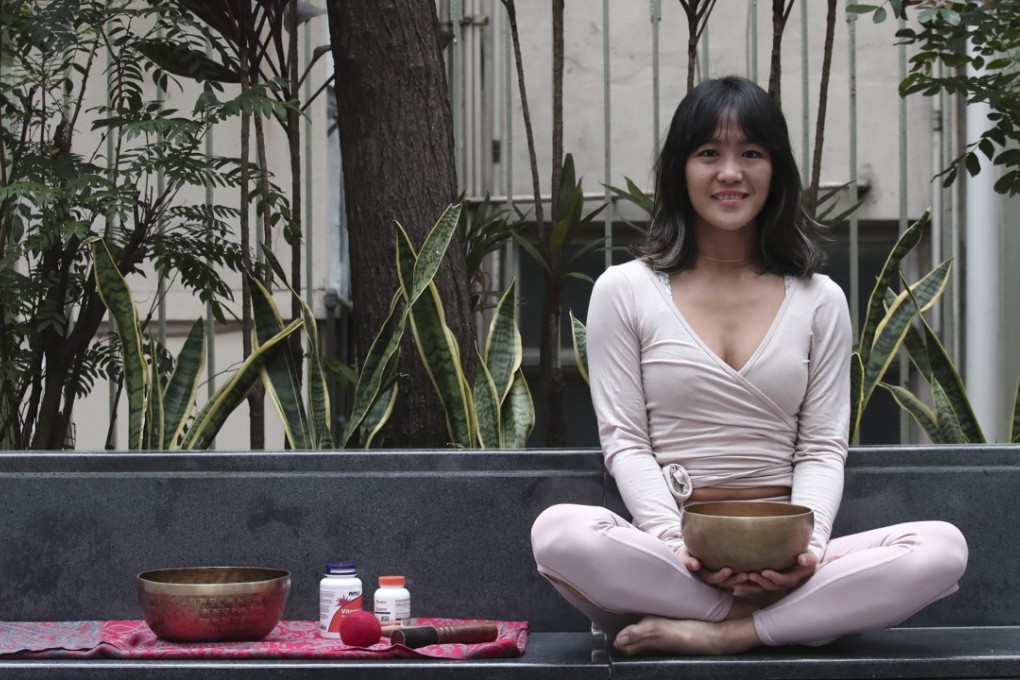 Eczema sufferer Ashley Pang with some of the things that help her control her chronic condition. Photo: Jonathan Wong