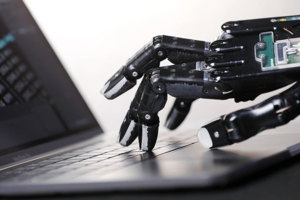 A senior Chinese economist has said that robots will “definitely” surpass human beings in their ability to handle many job skills in 10 to 20 years. Photo: Bloomberg