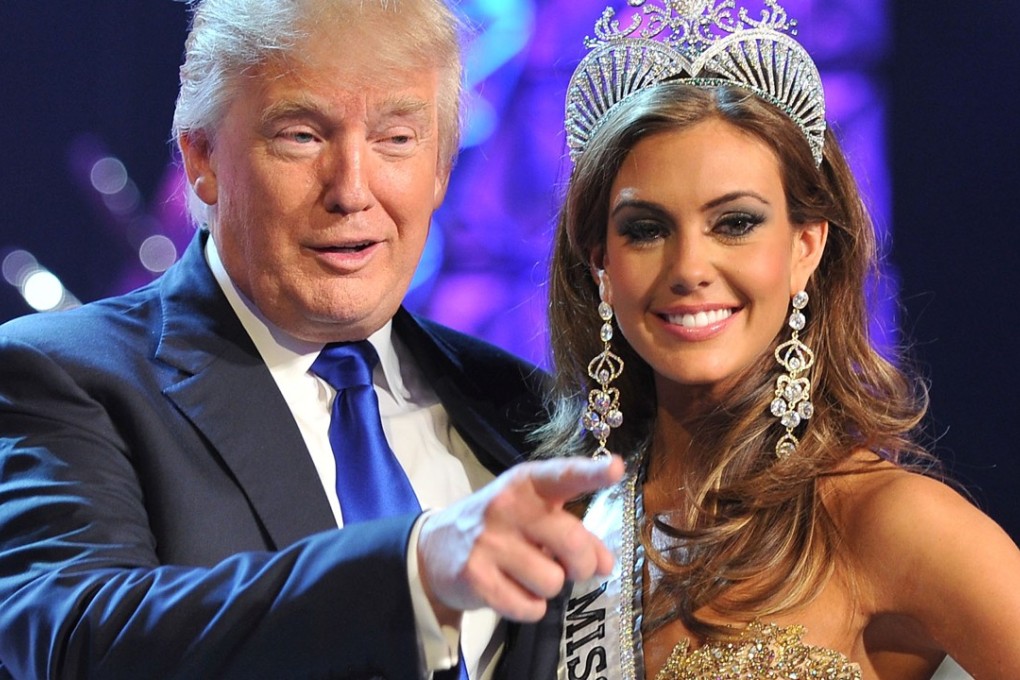 Donald Trump with Miss Connecticut USA Erin Brady after the 2013 Miss USA pageant in Las Vegas. That same year, Trump, owner of the Miss Universe pageant also, invited Russian President Vladimir Putin to attend the beauty contest in Moscow. Photo: AP