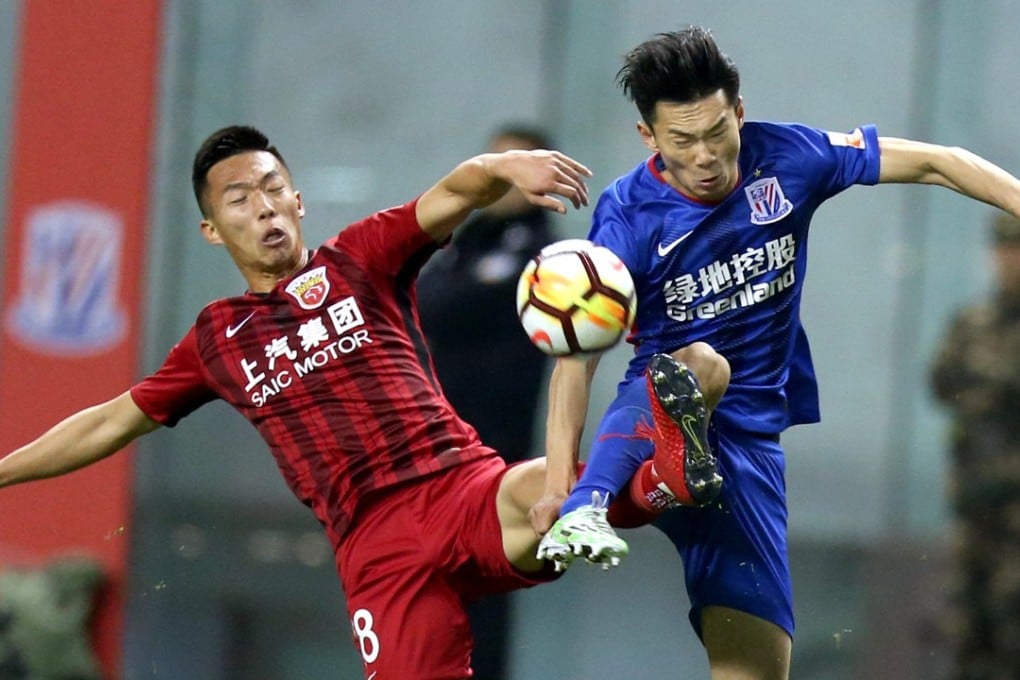 The Shanghai derby between Shenhua and SIPG was a hotly contested affair. Photo: Xinhua