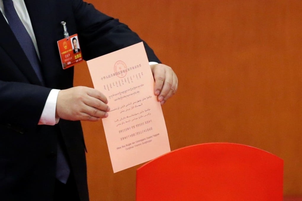 Chinese President Xi Jinping submits his ballot during the vote on changes to the constitution at the National People’s Congress at the Great Hall of the People in Beijing. Photo: Reuters