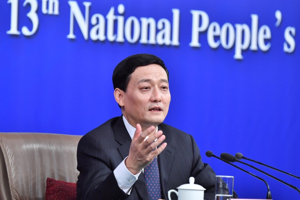 Sasac chief Xiao Yaqing says the regulator will use various means to cut debt ratios. Photo: Xinhua