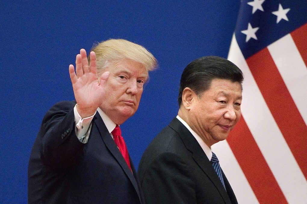 This file picture taken on November 9, 2017, shows US President Donald Trump (left) and China's President Xi Jinping leaving a business leaders event at the Great Hall of the People in Beijing. Photo: Agence France-Presse