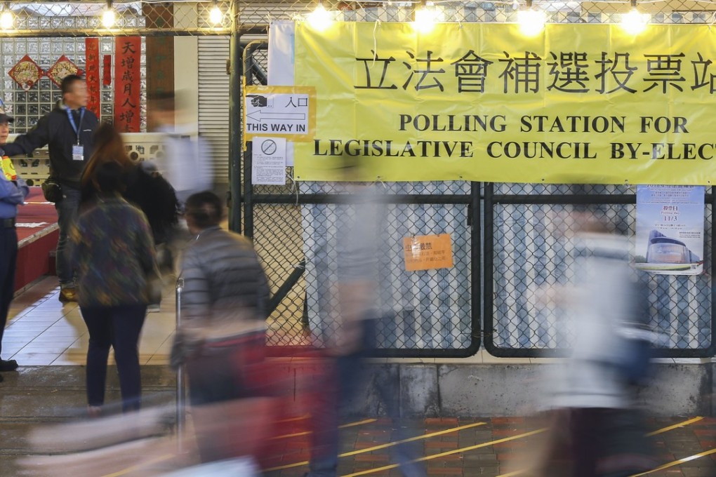 Voters queue up in Mei Foo to cast their ballots for the Legislative Council by-election. Photo: Dickson Lee