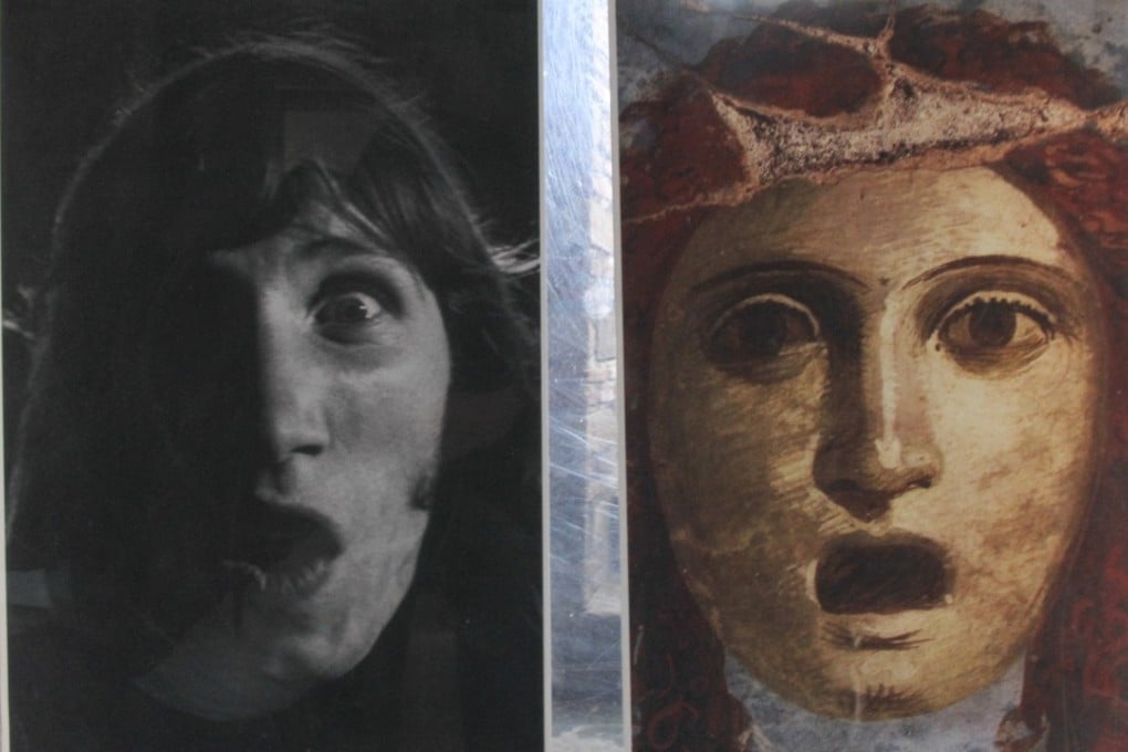 A picture of Pink Floyd band member Roger Waters is displayed next to an ancient portrait. Picture: Peter Simpson