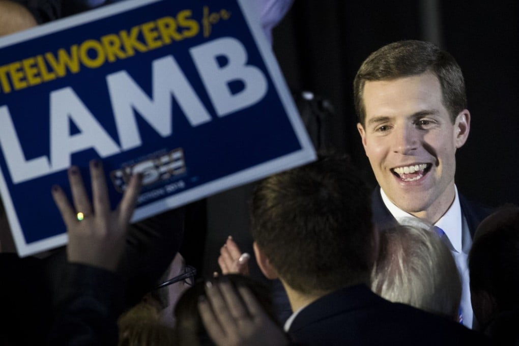 Conor Lamb, Democratic congressional candidate for Pennsylvania's 18th district, greets supporters at an election night celebration in Canonsburg, Pennsylvania, early on Wednesday. Photo: AFP