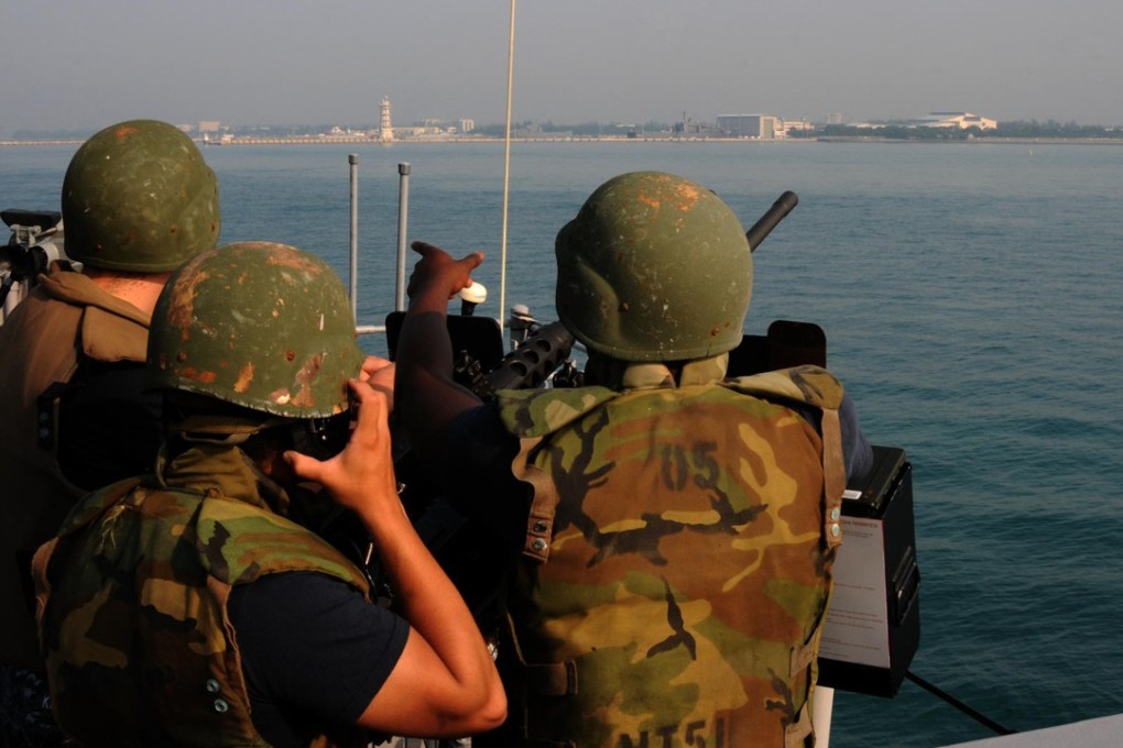 A multinational antipiracy and antiterrorism security force patrols the Strait of Malacca. China has also increased its naval presence in the strait to protect its interests. Photo: Alamy