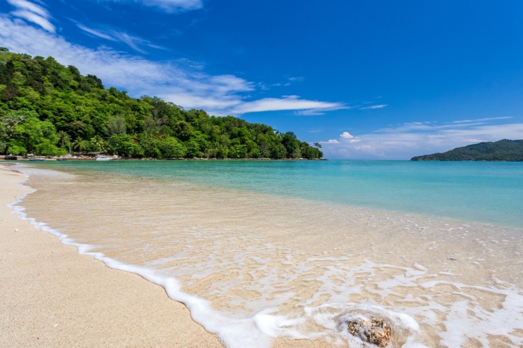 The beach in front of Rosewood Phuket.