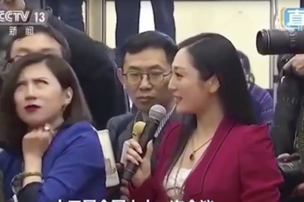 Liang Xiangyi (left), a China Business News reporter, rolled her eyes as a fellow journalist asked a question at a press conference on the sidelines of the National People’s Congress meeting on Tuesday. Photo: CCTV