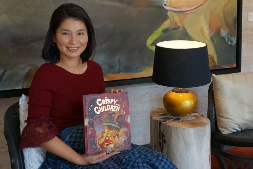Libby Lam with her book “Crispy Children”. Photo: Sophia Lam/SCMP