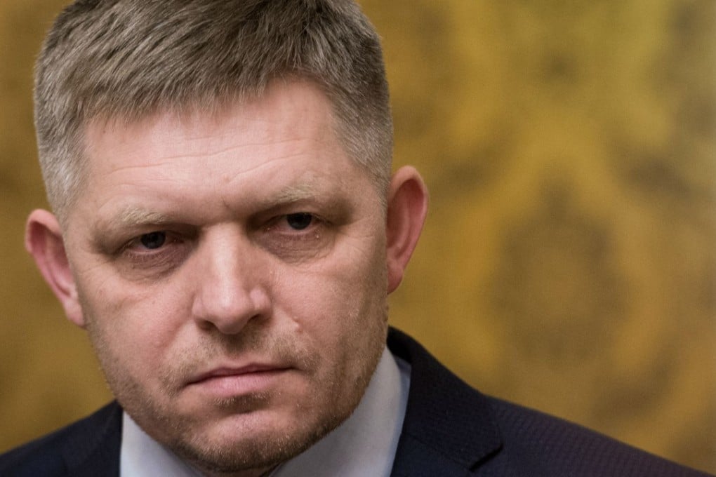 Slovak Prime Minister Robert Fico looks on during a press conference in Bratislava on March 14, 2018. Slovak Prime Minister Robert Fico announced Wednesday, March 14, 2018, his resignation, demanded by the opposition, following the assassination in February of the investigative journalist Jan Kuciak. / AFP PHOTO / VLADIMIR SIMICEK