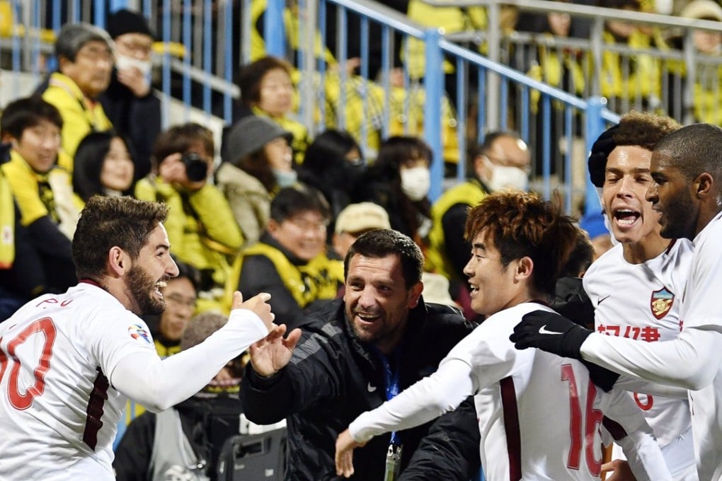 Tianjin Quanjian’s Alexandre Pato (L) celebrates with his teammates after scoring the 1-1 in the AFC Champions League. Photo: EPA