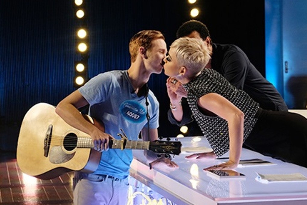 American Idol judge Katy Perry kisses contestant Benjamin Glaze. Photo: American Idol