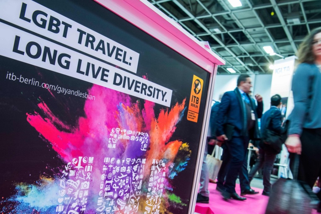 A placard advertising LGBT travel at the ITB travel trade fair in Berlin. Photo: John MacDougall