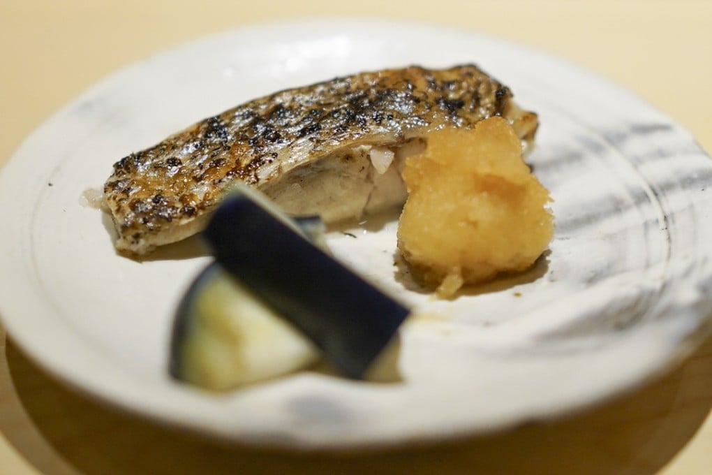 Grilled nodoguro (black throat sea perch) by Takashi Saito at Sushi Saito, Tokyo.