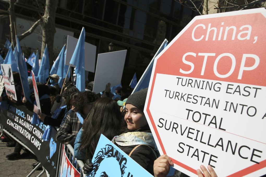 Uygurs and their supporters rally across the street from United Nations headquarters in New York on Thursday. Photo: AP