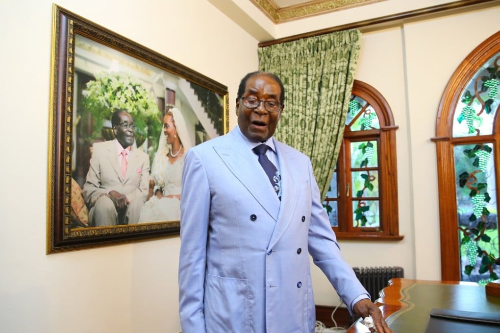 Former Zimbabwean President Robert Mugabe speaks to the media at his residence in Harare on March 15. Photo: EPA