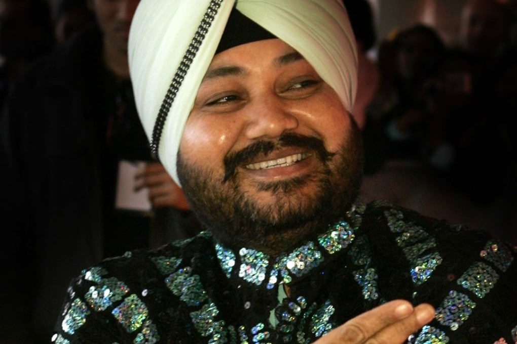Popular Indian singer Daler Mehndi was convicted of cheating and human trafficking and sentenced to two years in prison, but released on bail pending appeal. Photo: AP