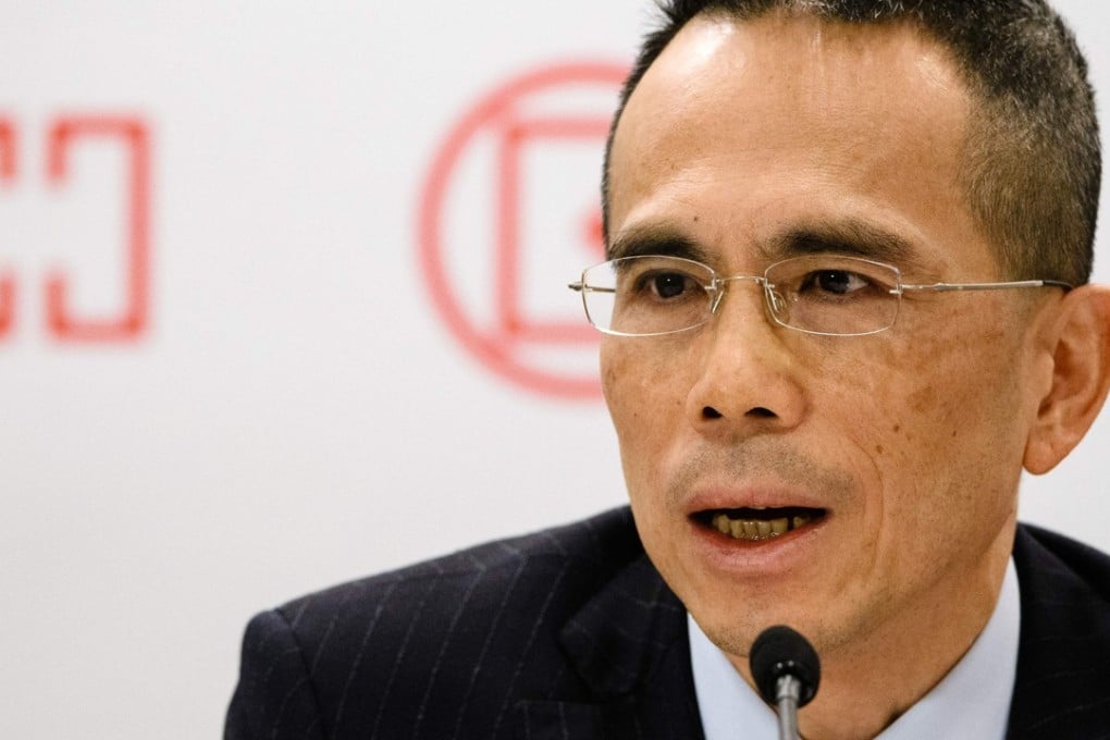 Victor Li, son of Hong Kong’s richest man Li Ka-shing, speaks during a press conference in Hong Kong on Friday. Li Ka-shing announced he was stepping down as chairman of his flagship company CK Hutchison, and will hand over the reins to Victor. Photo: AFP