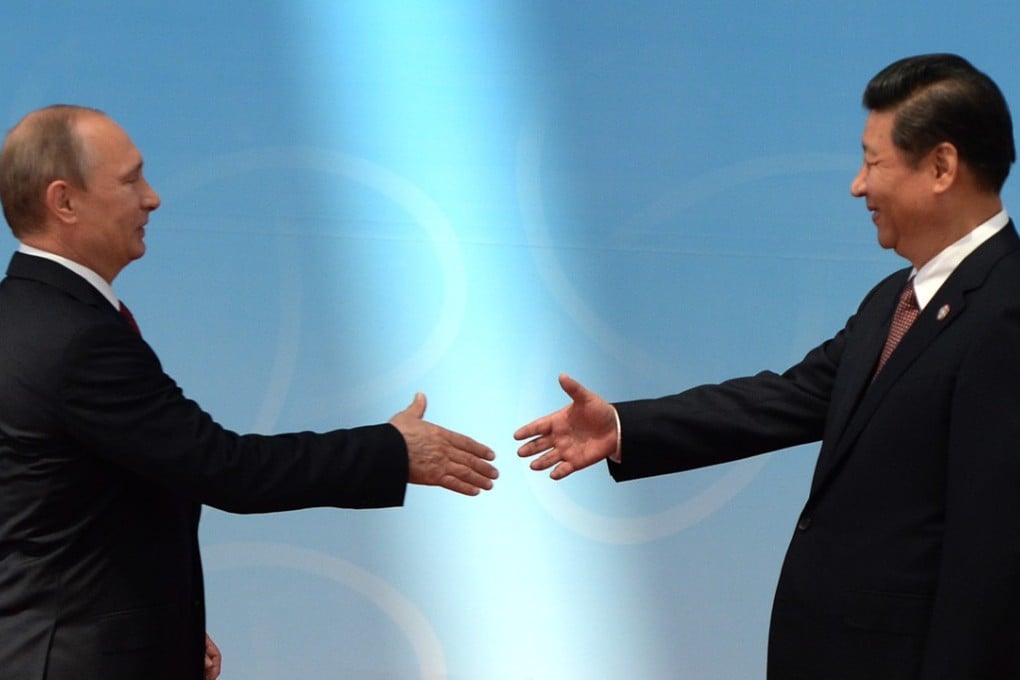 Vladimir Putin will seek to become Russian president for a fourth time on Sunday, while Xi Jinping was sworn in for a second term on Saturday. Photo: AFP