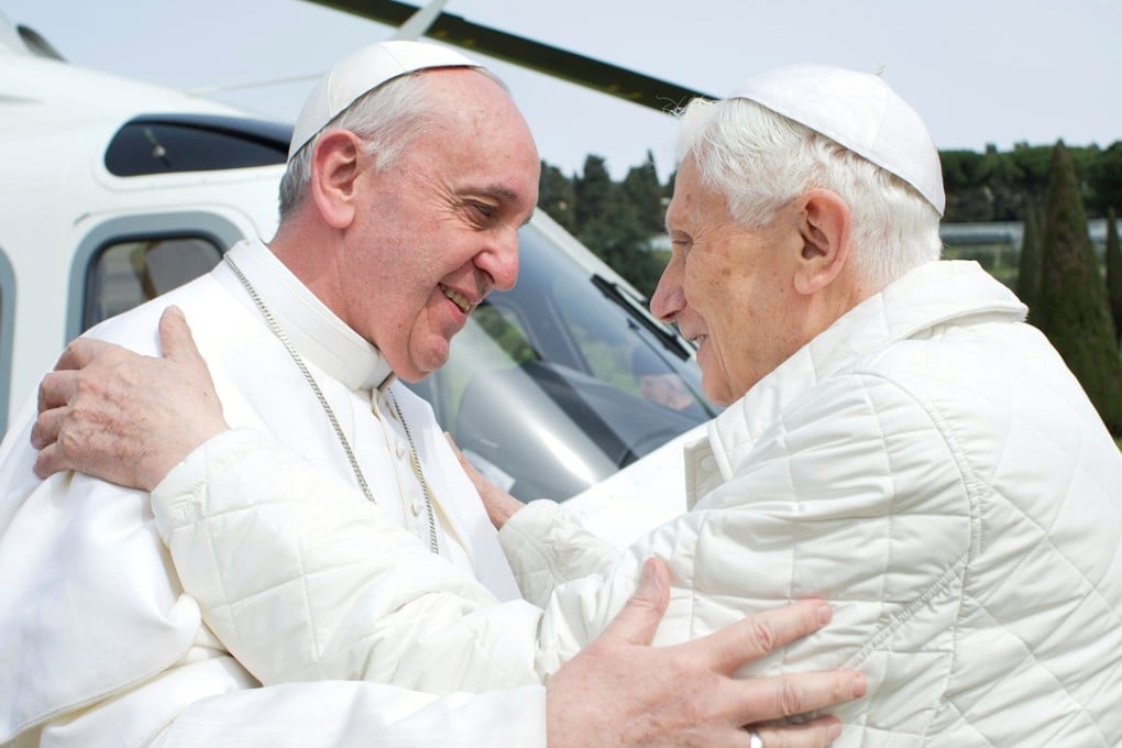 Pope Francis embraces Pope Emeritus Benedict XVI in 2013. File photo: Reuters