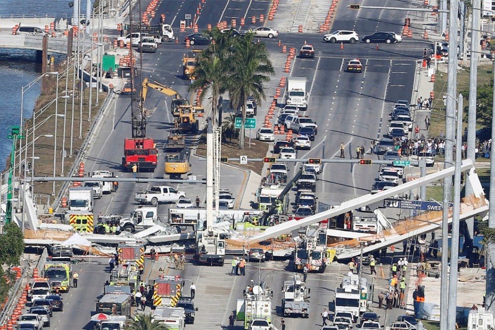 This aerial view shows a pedestrian bridge that collapsed at Florida International University in Miami, Florida, on Thursday. Bodies were still being retrieved on Saturday. Photo: Reuters