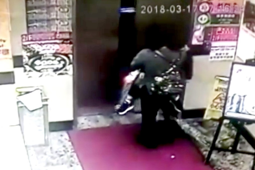 A CCTV image that appears to show the woman entering the building with the boy. Photo: Handout.