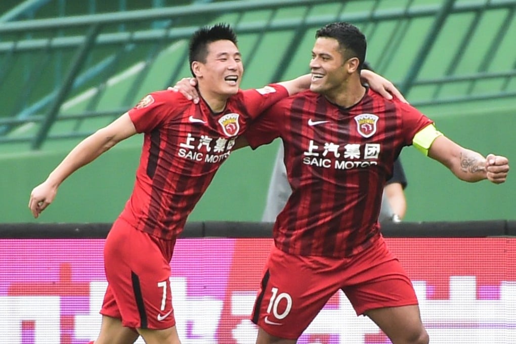 Wu Lei celebrates yet another hat-trick with Hulk as Shanghai SIPG secured a 5-2 Chinese Super League win over Guangzhou R&F. Photo: Xinhua