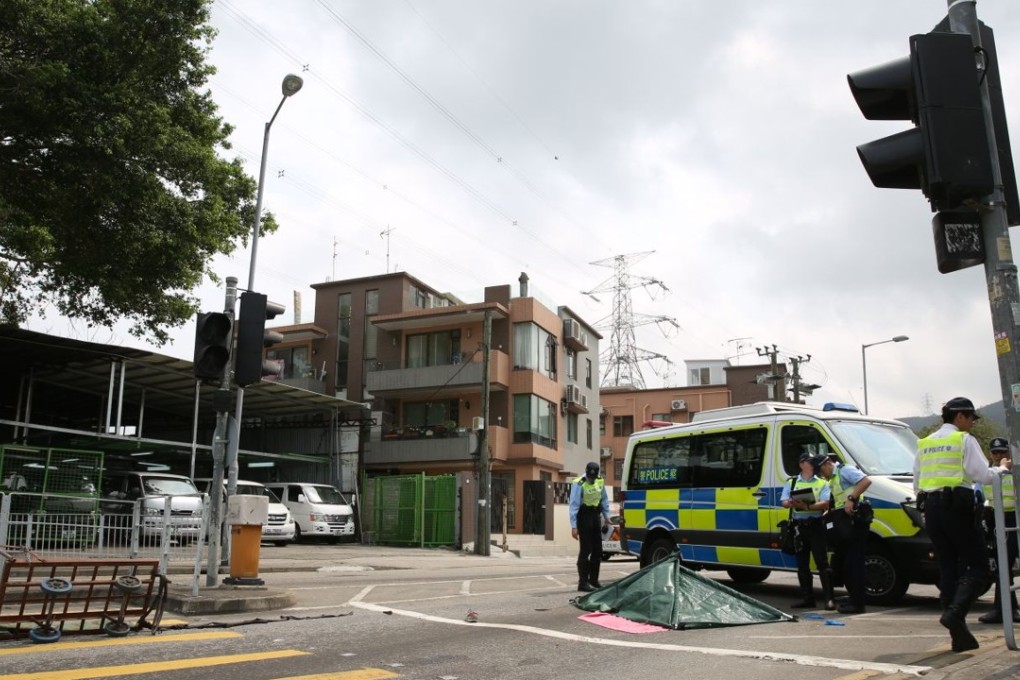 Police investigate the scene of a hit-and-run incident in Shun Tat Street, Tuen Mun. Photo: Handout