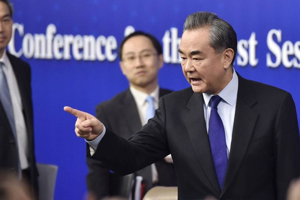 Chinese Foreign Minister Wang Yi answers questions from reporters during a press conference in Beijing earlier this month. Photo: Kyodo