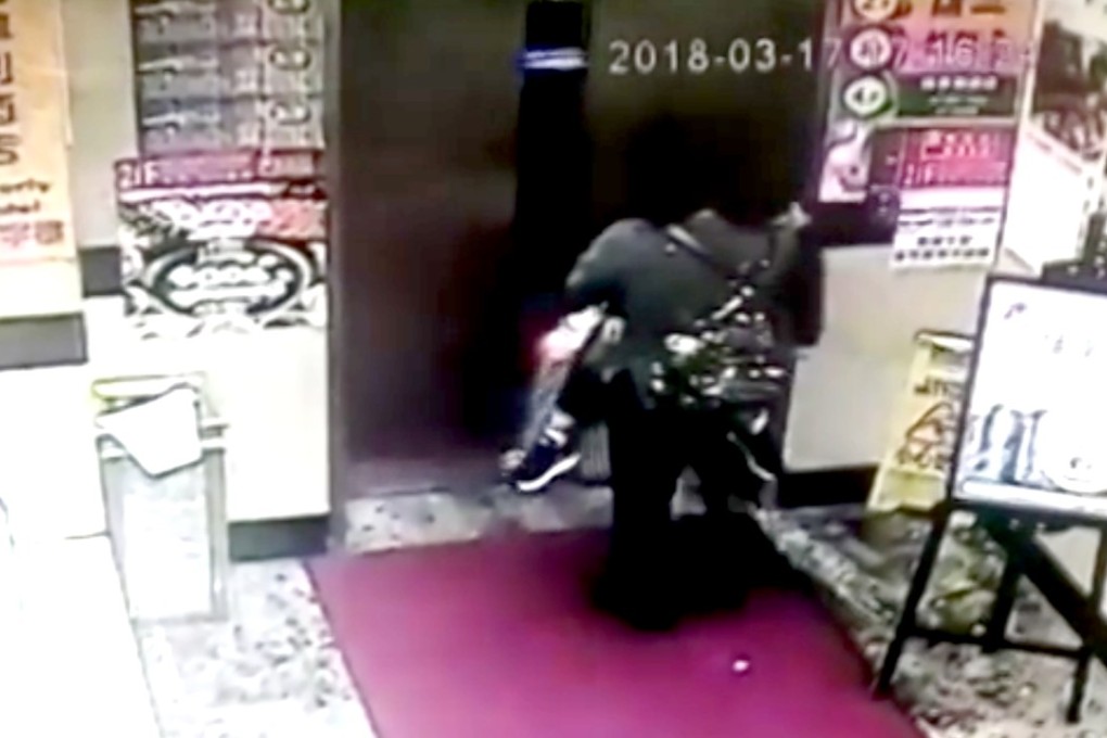 A screen grab reportedly showing the woman and the boy at the Capital Building in Wan Chai, where the Beverly Hotel is located. Photo: Handout