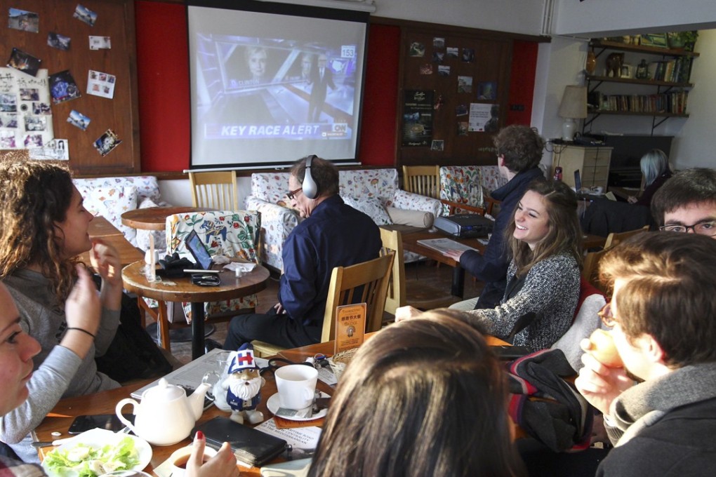 Foreigners watch a live broadcast of the US election at a cafe in Beijing in November 2016. Beijing recently banned foreigners gathering in groups of 10 or more at restaurants in its university district during China’s annual parliamentary meetings. Photo: Simon Song