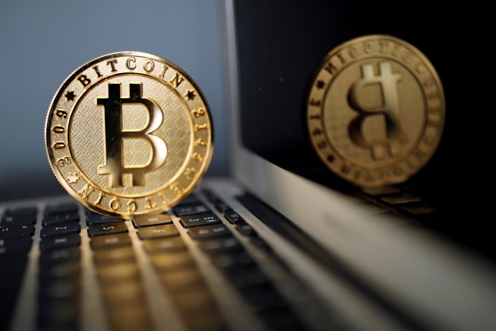 The SFC has been stepping up efforts to regulate ICOs and other activities involving digital currencies. Photo: Reuters