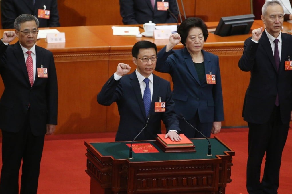 China’s four vice-premiers (from left) Hu Chunhua, Han Zheng, Sun Chunlan and Liu He swear an oath to the constitution at the National People’s Congress in Beijing on Monday. Photo: EPA-EFE