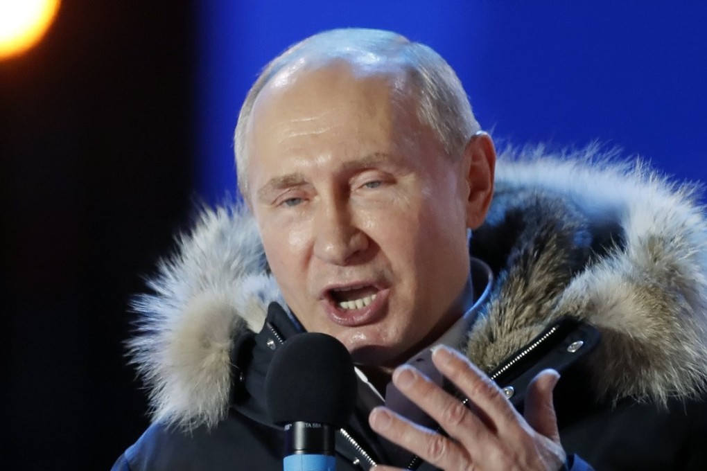 Russia’s President Vladimir Putin delivers an election-night speech near the Kremlin in Moscow. Photo: EPA