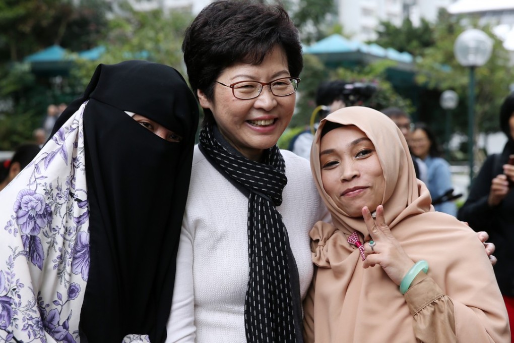 Chief Executive Carrie Lam Cheng Yuet-ngor meets ethnic minority residents in Hung Hom after winning the chief executive election in late March 2017. Photo: Sam Tsang