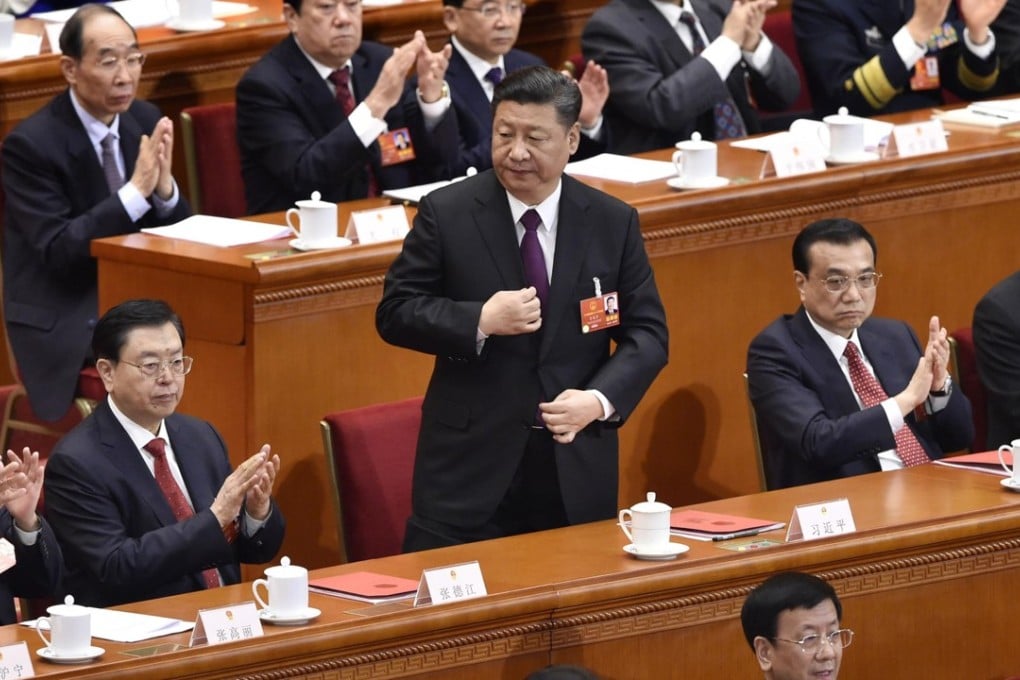 Xi Jinping (centre) sent a strong nationalist message in his closing speech to the National People’s Congress on Tuesday. Photo: Kyodo