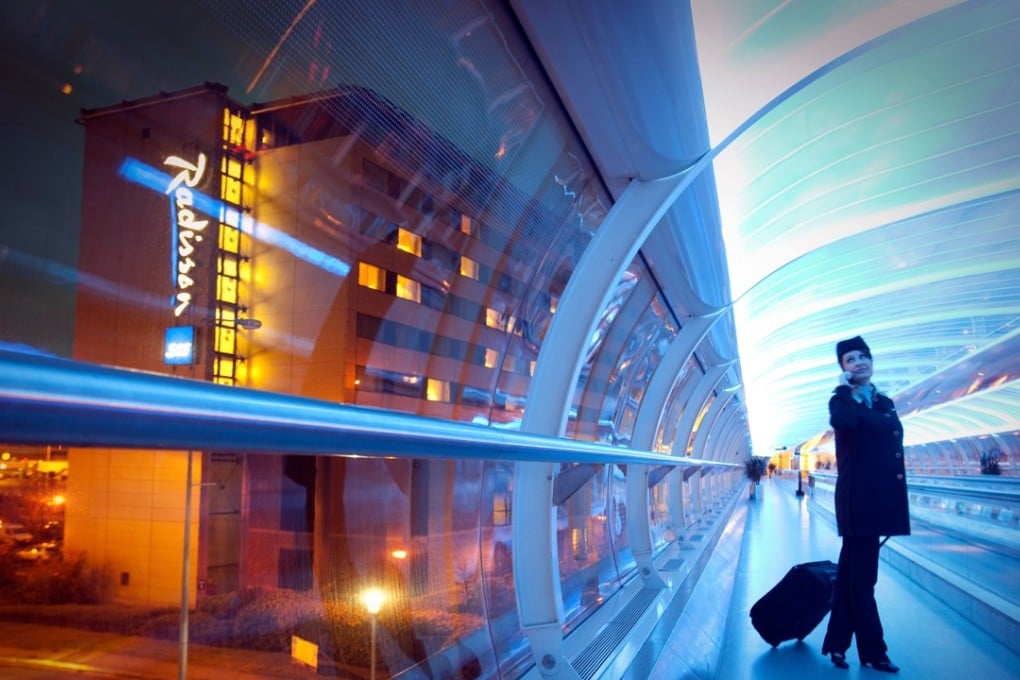 It’s not uncommon for female flight attendants to wear trousers these days. Photo: Alamy