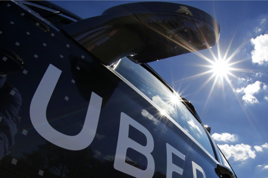 A self-driving Uber sits ready to take journalists for a ride during a media preview in Pittsburgh. Photo: AP