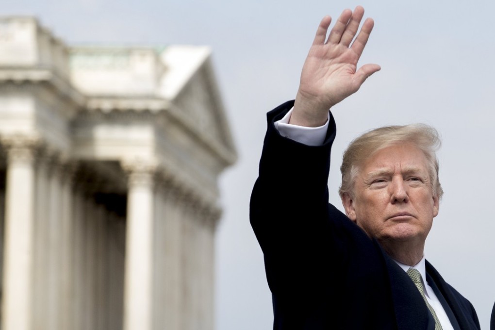 US President Donald Trump waves to members of the news media in Washington on March 15. He is tampering with a global trade system that has not been tested in its present form. Photo: EPA-EFE