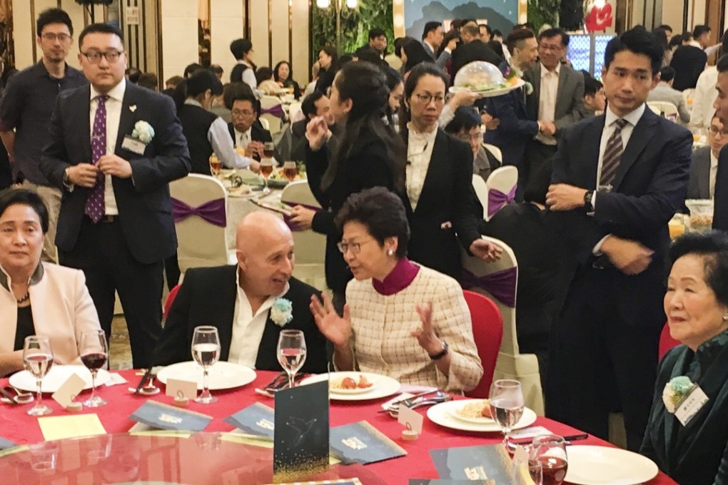 Hong Kong Chief Executive Carrie Lam (centre) attending the Democratic Party’s 23rd anniversary dinner held in Kowloon Bay. Photo: Alvin Lum