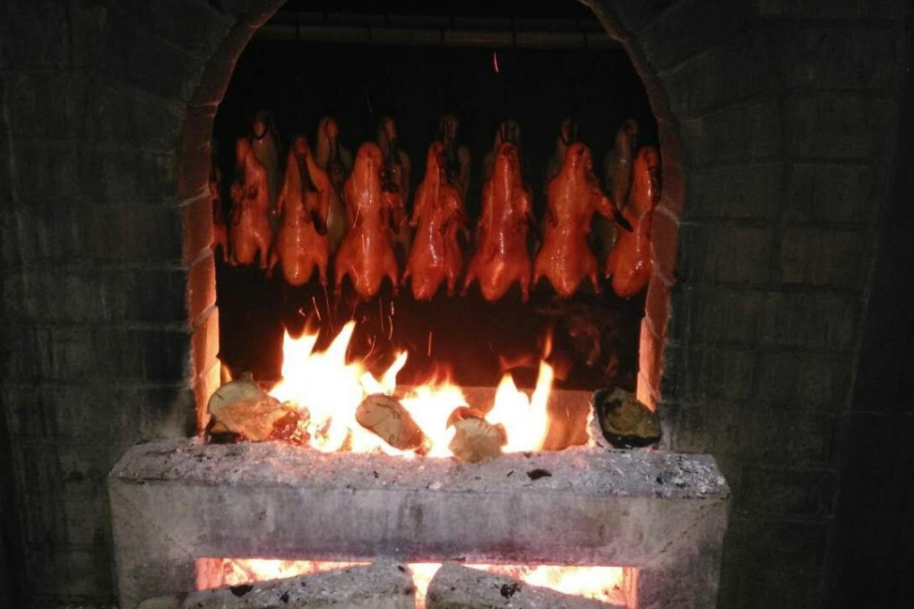 Peking Duck in a traditional wood-fired over. Photo: SCMP/Veronica Lin
