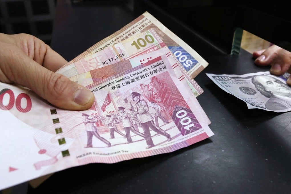 Money exchange of Hong Kong dollar to American U.S dollar in Wan Chai. 9 March 2018. Photo SCMP / Jonathan Wong