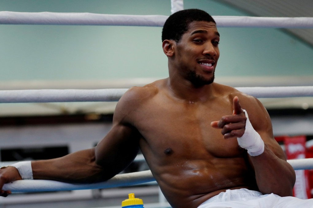 Anthony Joshua has urged his heavyweight rival Deontay Wilder to get serious about negotiations for a potential super fight. Photo: Reuters