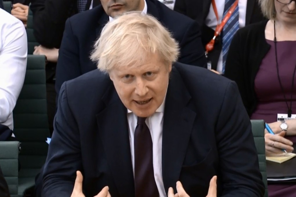 A video grab from footage broadcast by the UK Parliament's Parliamentary Recording Unit (PRU) shows Britain's Foreign Secretary Boris Johnson giving evidence before the Foreign Affairs Committee at Parliament in London on Wednesday. Photo: AFP