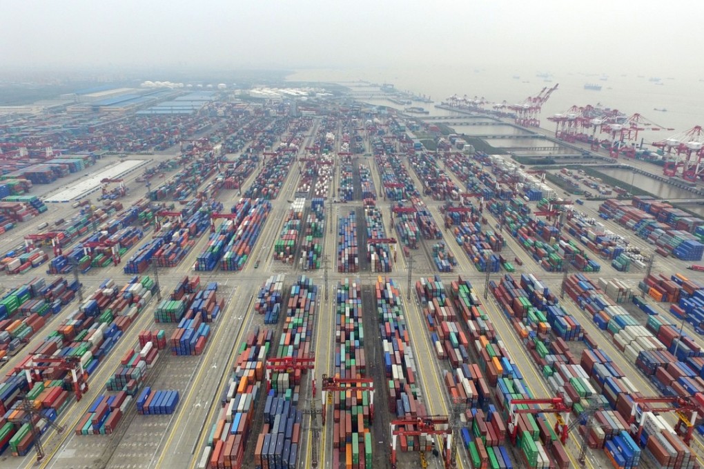 This aerial photo shows the free-trade zone in Shanghai at Yangshan deep water port, the world’s largest harbour for container cargo, on March 29, 2016. Photo: Xinhua/Ding Ting