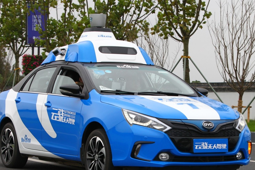 People take test ride of a Baidu driverless car. Photo: SCMP