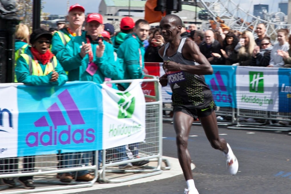 Eliud Kipchoge, arguably the greatest marathoner in the world right now, is often seen grinning during a race. Photo: Alamy