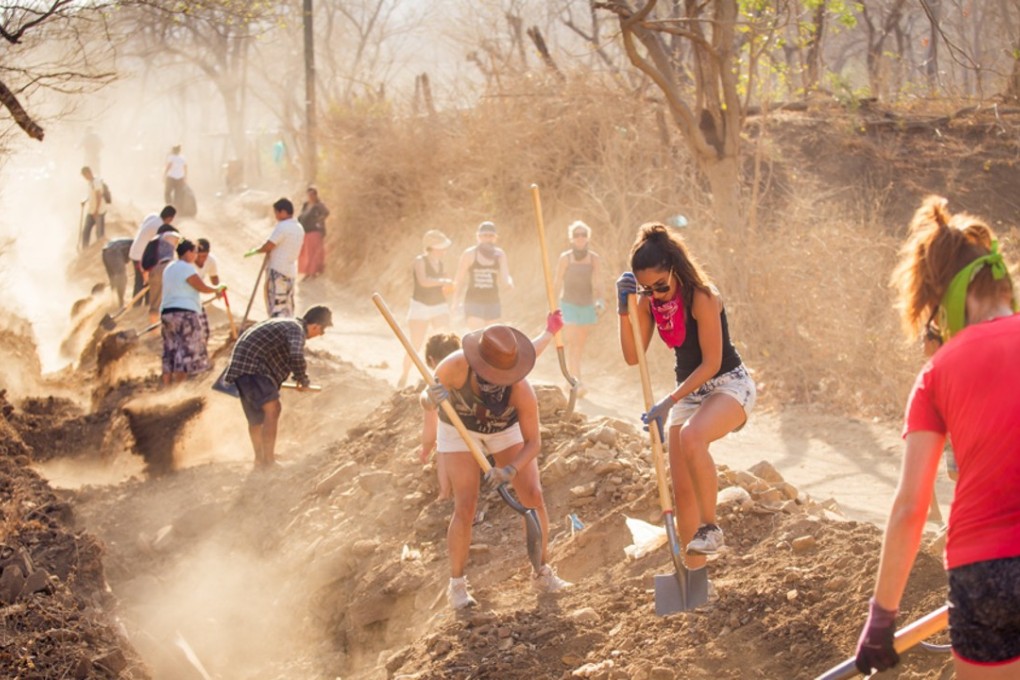 The 109 World members combined their Yoga Girl retreat to Playa Gigante, Nicaragua, with working as volunteers to set up a local water distribution system there. Photo: Courtesy 109 World