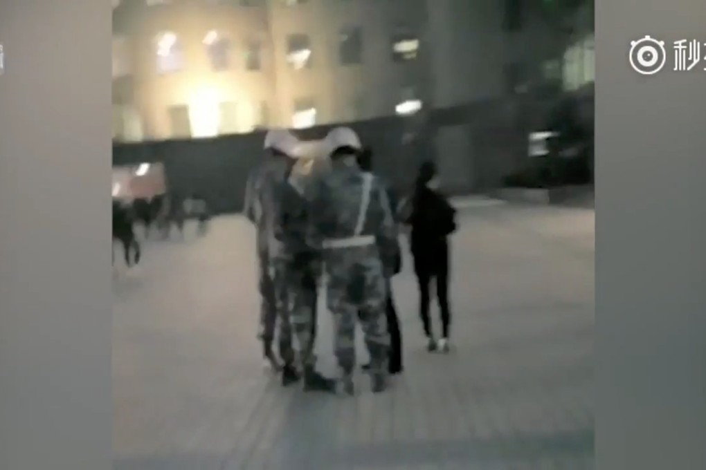 Inspectors wearing camouflage uniforms and helmets seen on campus at the Binzhou Vocational College in Shandong province checking for ‘intimate acts’ among students. Photo: Thepaper.cn